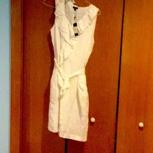White Talbots linen dress with ruffle down front